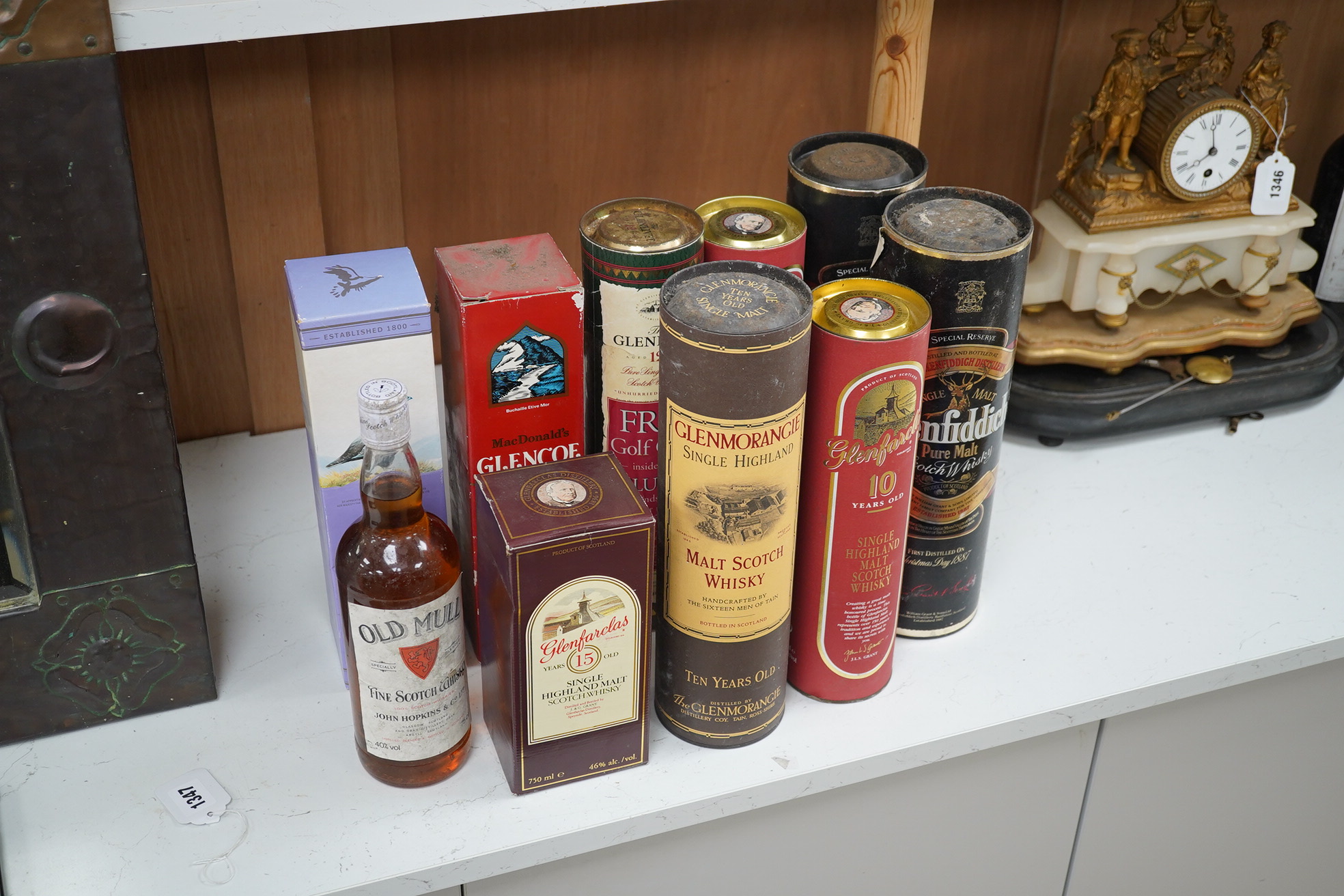 A group of ten bottles of Scotch Whisky; Glenfiddich Pure Malt Special Reserve 1 litre x2, Glenmorangie ten year 1litre, Glenlivet 12 year 70cl, Macdonalds Glencoe 8 year 70cl, The Famouse Grouse 10 year 70cl, John Hopki